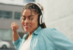 woman-dancing-and-listening-to-music-in-the-city